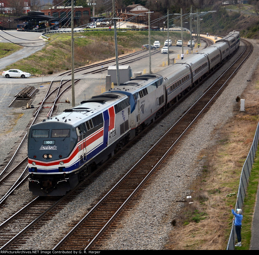 Amtrak Crescent, train #20, leaves Lynchburg and gets a wave from a trail walker 